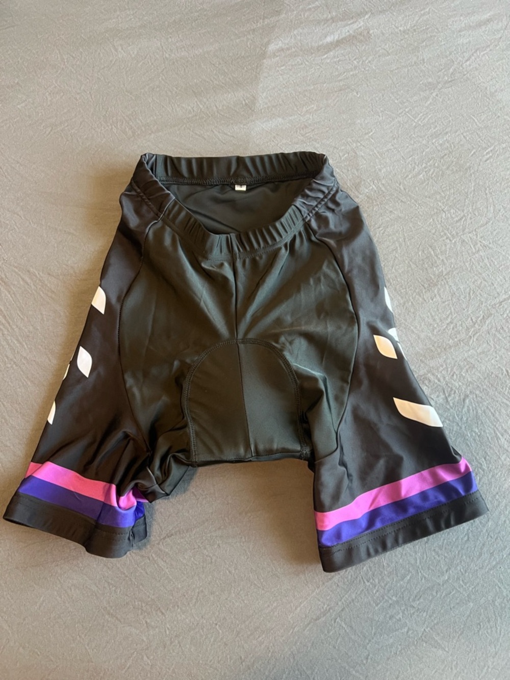 Liv Cycling Women's Black Bike Shorts with Pink & Purple Trim